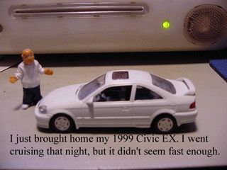 1996 Ford Probe - Model car and figure on a surface with text.