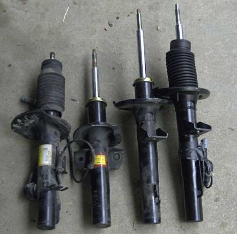 1997 Ford Taurus - Rears on left, fronts on the right. Gen 2 struts are the shorter ones.
