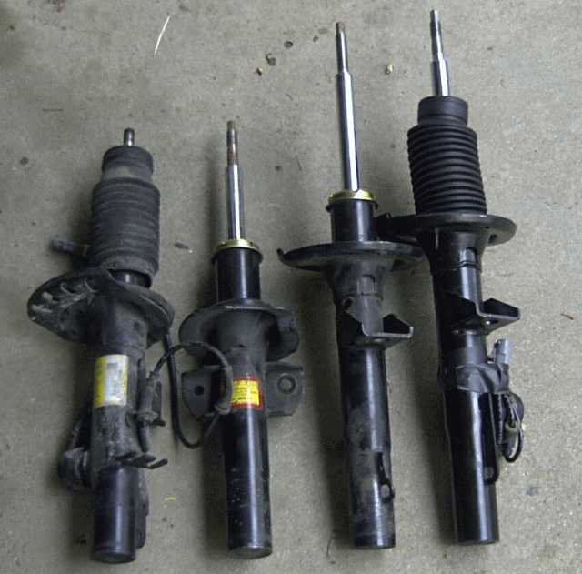 Rears on left, fronts on the right.  Gen 2 struts are the shorter ones.