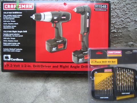 1990 Ford Bronco - Craftsman C3 19.2-volt cordless drill/driver and right-angle drill combo box sits beside a packaged Craftsman 21-piece cobalt drill bit set.