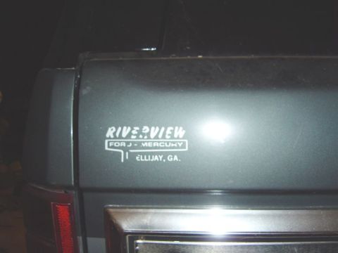 1986 Ford Bronco - Vehicle rear quarter panel displays a decal for Riverview, a J-Mercury dealer in Ellijay, GA.