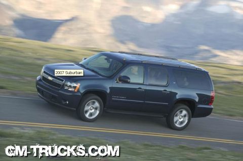 1991 Ford LTD Crown Victoria - A dark blue 2007 Chevrolet Suburban is captured in motion on a paved road, with a clear text overlay identifying the model and year.