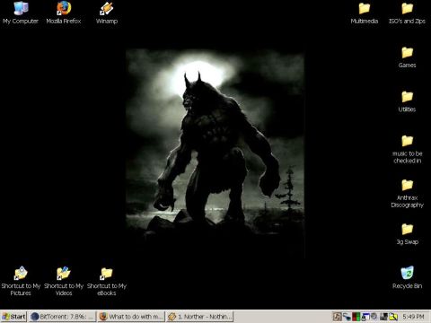 1991 Ford LTD Crown Victoria - A dark, moody desktop wallpaper depicts a werewolf silhouetted against a moonlit sky.
