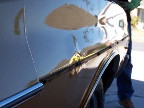 1973 Ford Ranchero - Second shot of dent with trim removed. 75% of dent hammered out.