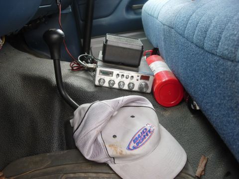 1995 Ford Bronco - CB radio and Bud Light cap visible inside the vehicle's interior.