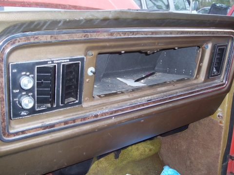 1978 Ford Bronco - The interior dashboard features air conditioning controls and an empty slot where a radio would be installed.