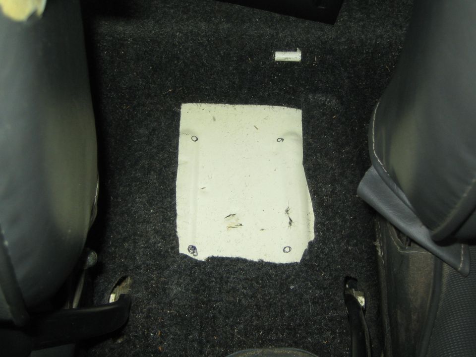 Interior floor panel with four bolt holes