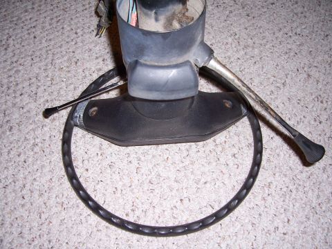 1978 Ford Bronco - A steering column and wheel assembly is shown, with visible wiring and levers.