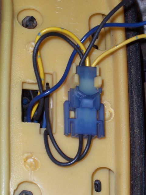1978 Ford Bronco - A blue electrical connector with yellow and black wires is visible in this close-up view.