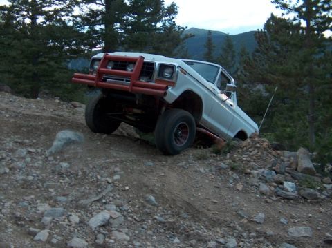 1978 Ford Bronco - This 1978 Ford Bronco navigates a steep, rocky incline, its off-road capabilities.