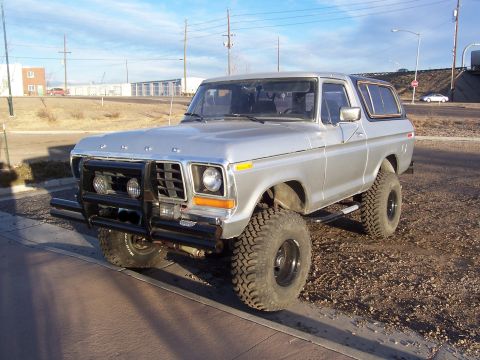 1978 Ford Bronco - This silver 1978 Ford Bronco is equipped with a bull bar and off-road tires.