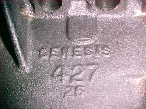1967 Ford Galaxie - Close-up of a metal engine component showing cast lettering and numbers.