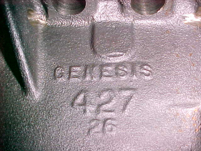 Cast aluminum part stamped 'GENESIS 427 26'