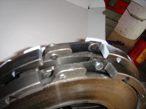 1991 Ford Taurus - Close-up of a clutch pressure plate, a component of a vehicle's drivetrain.
