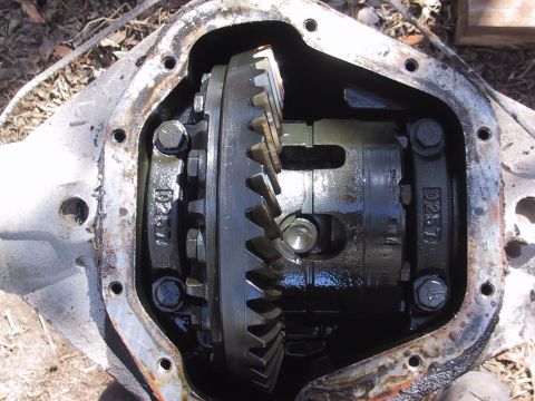 1990 Ford Bronco - Close-up view of a vehicle's differential, revealing its internal gears and housing.