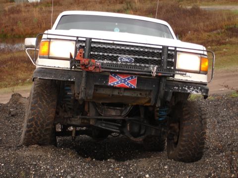 1989 Ford Bronco - This 1989 Ford Bronco features a lifted suspension and off-road tires, ready for terrain.