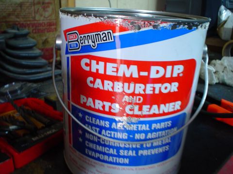 1984 Ford Bronco - A can of Berryman Chem-Dip Carburetor and Parts Cleaner is shown in a workshop setting.