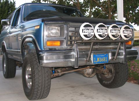 1984 Ford Bronco - This Ford Bronco has a lifted suspension and auxiliary lights mounted on a custom front bumper.