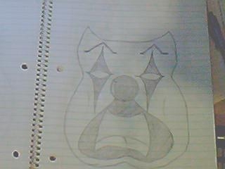 1980 Ford Bronco - A hand-drawn clown face is depicted on a page from a spiral-bound notebook, marked with a website watermark.