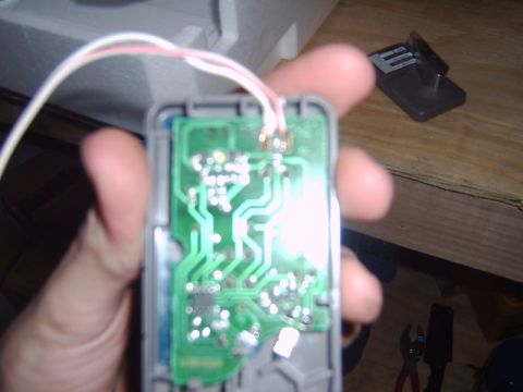 1998 Jeep TJ - Close-up of a circuit board with wires, likely a component from a vehicle.