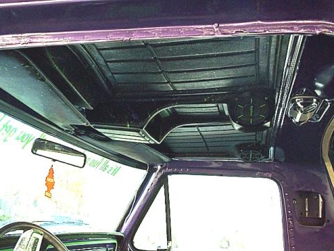 1978 Ford Bronco - Interior view of a 1978 Ford Bronco, highlighting aftermarket speaker installation.