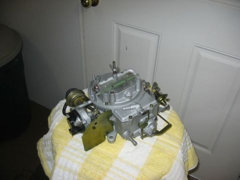 1979 Ford Bronco - Carburetor sits on a towel, likely for a rebuild or cleaning project.