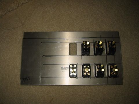 1992 Ford Bronco - Custom switch panel with multiple toggle switches and wiring terminals.