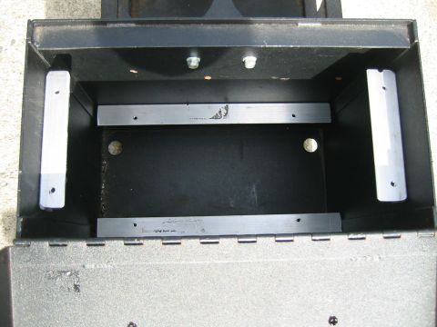 1992 Ford Bronco - This is an empty metal storage box with internal mounting brackets.