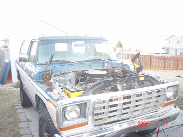 1978 Ford Bronco with hood open, showing engine bay and front grille