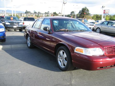 2005 Ford Crown Victoria - This 2005 Ford Crown Victoria sedan is shown from a three-quarter front angle in a dealership lot.