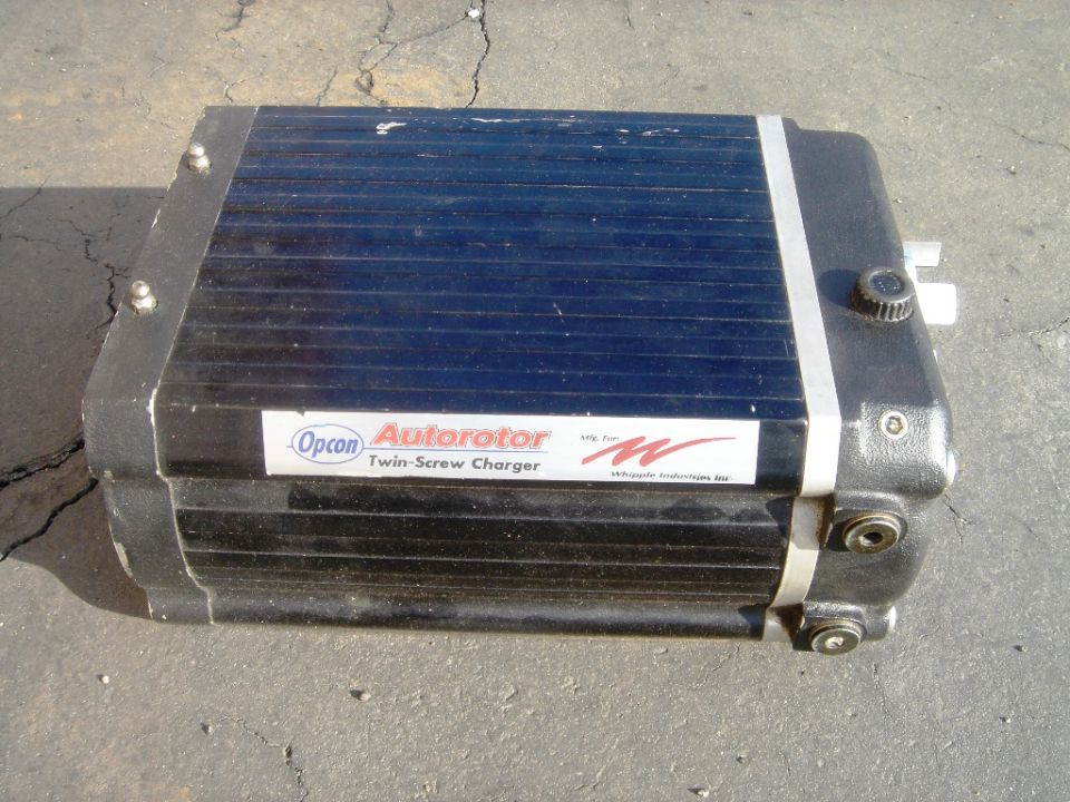 Opcon Autorotor Twin-Screw Charger with "Mfg. For" and "W" logo