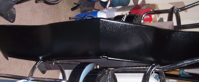 1972 Ford Ranchero - A custom black car body with chrome framing is shown, possibly a go-kart or a unique vehicle build.