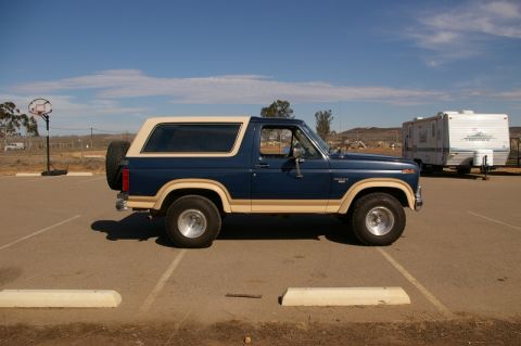 1986 Ford Bronco - This 1986 Ford Bronco is seen parked in a lot on a sunny day.
