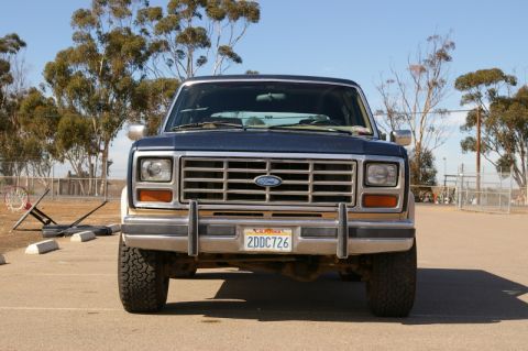 1986 Ford Bronco - The front grille and headlight design are consistent with a Ford Bronco from the early 1980s.