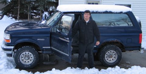 1994 Ford Bronco - Me, looking like a doofus, wearing tennis shoes in the snow, but happy because I finally had a Bronco again.
