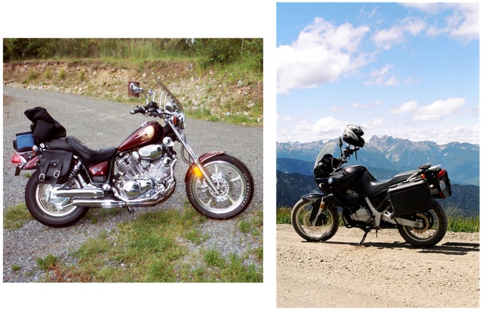 Two motorcycles parked outdoors, one maroon cruiser and one black touring bike with luggage