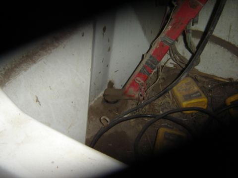 1992 Ford Bronco - A look at the wiring and some yellow containers inside a vehicle.