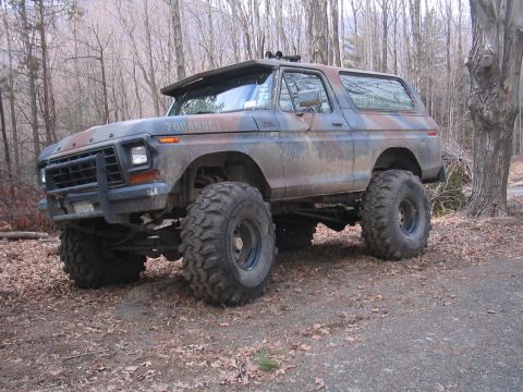 1979 Ford Bronco - This lifted 1979 Ford Bronco features camouflage paint and sits high on off-road tires.