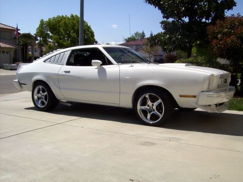 1978 Ford Mustang II - This 1978 Ford Mustang II coupe features distinctive rear quarter window louvers and custom wheels.