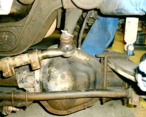 1985 Ford Bronco - This image shows the steering linkage and front axle components of a vehicle, not a specific model year.