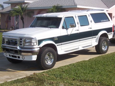 1993 Ford C-350 (Centurion Conversions) - White 1993 Ford C-350 Centurion Conversions van parked on a driveway.