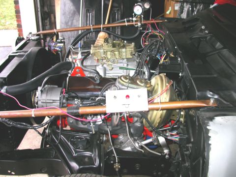 1968 Chevrolet Camaro - Engine bay components including V8 engine, carburetor, and brake booster are visible.