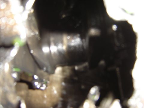 1992 Ford Bronco - Detail shot of an engine part, likely from a Ford vehicle, with unclear features.