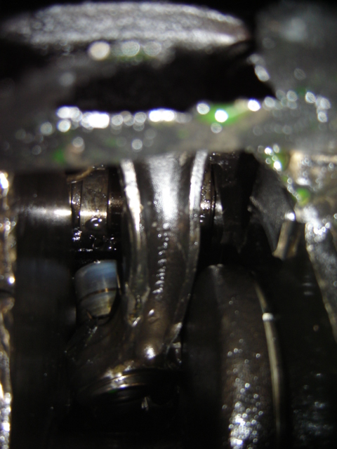 1992 Ford Bronco - A close-up view of internal engine components, showing mechanical parts in detail.