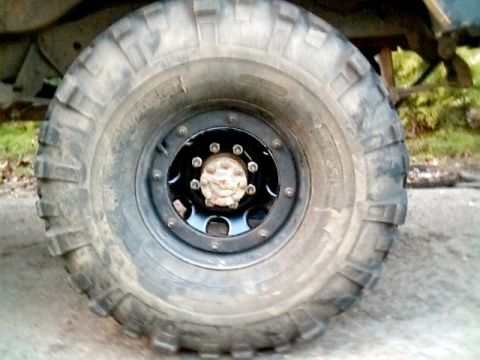 1978 Ford Bronco - This photo shows a close-up of a single off-road tire and wheel assembly, not the entire vehicle.