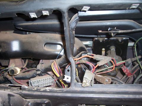 1978 Ford Bronco - Close-up view of the underdash wiring harness, showing various connectors and bundled cables.