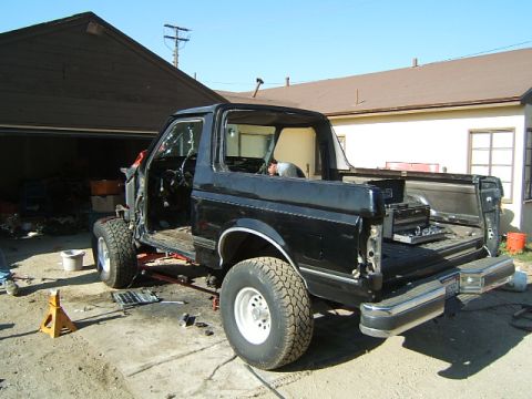 1988 Ford Bronco - This 1988 Ford Bronco is shown with its doors removed, revealing the interior and indicating it is undergoing some form of repair or modifi…