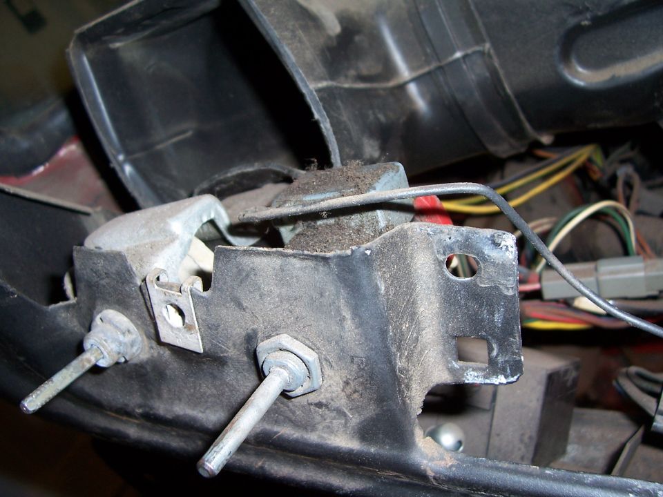 Dashboard bracket with two bolts and wiring harness