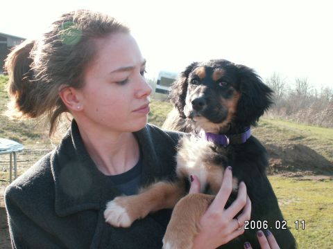 1991 Ford Explorer - Woman holds a puppy outside with a watermark indicating the photo was taken on February 11, 2006.
