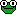 1968 Ford Mustang - A close-up of a pixelated green smiley face with large white eyes and a wide grin.